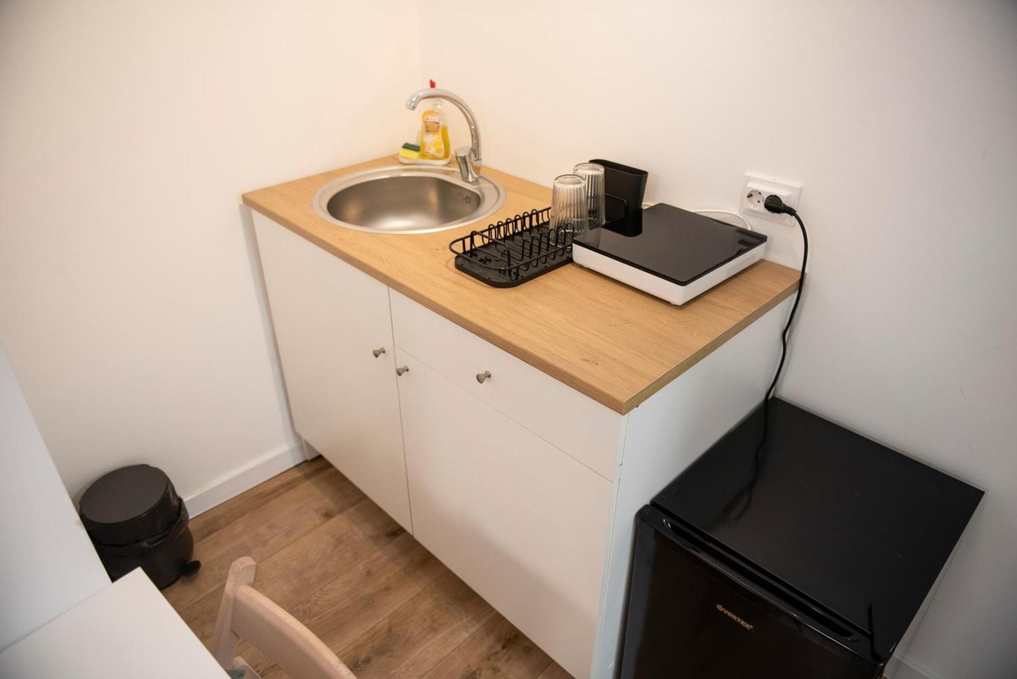Lazynest Residence Bukares Bagian luar foto